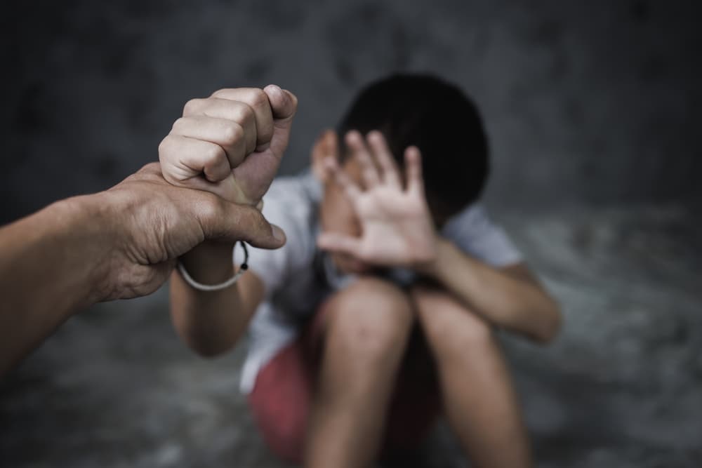 Concept image depicting the fight against child abuse and violence, highlighting human rights violations and the urgent need to stop human trafficking.