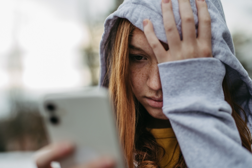 sad teen suffering after abuse at Lakeland Behavioral Health in Missouri
